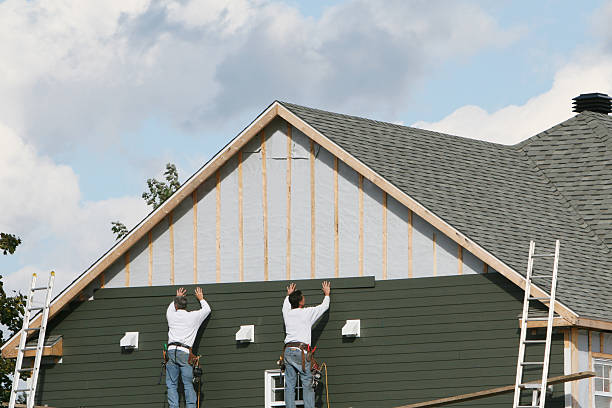 Professional Storm Damage Siding Repair technician working in Broad Brook, CT